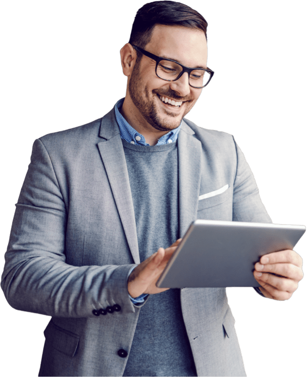 Man smiling and using tablet