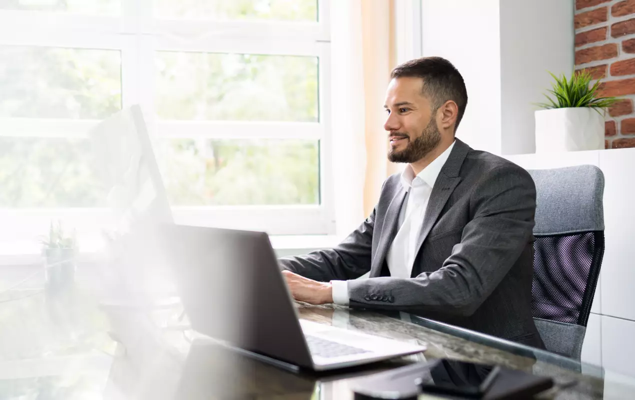 Man using computer at desk