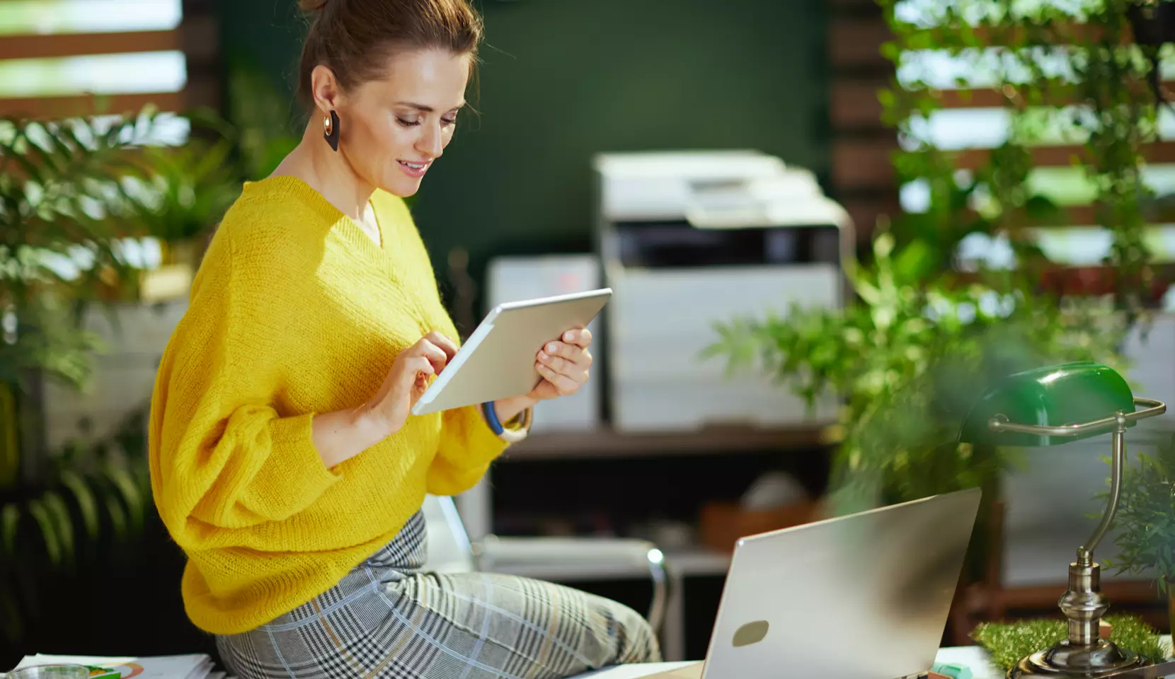 Woman on the phone using tablet