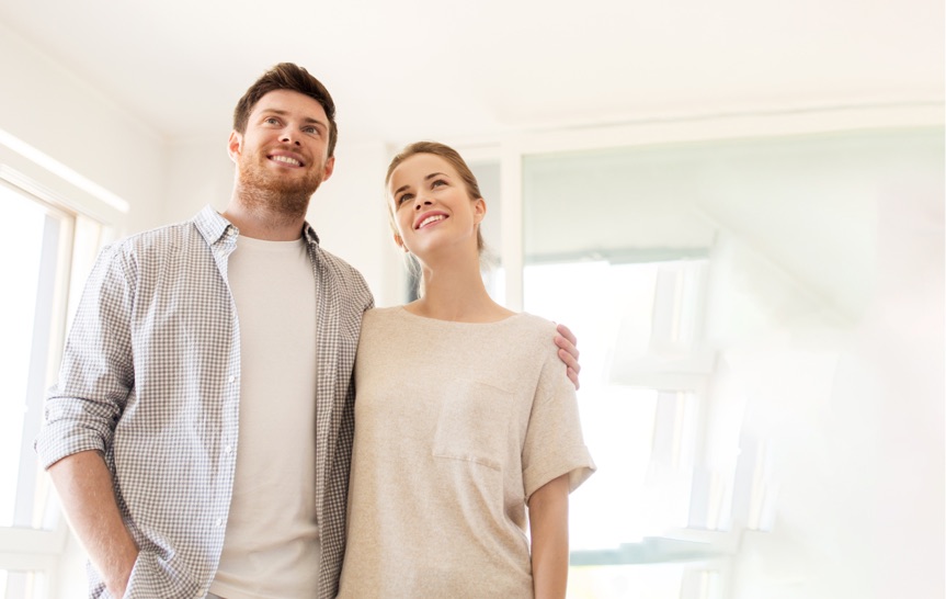 Smiling couple in new home